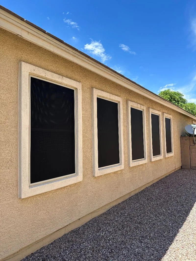 Five Windows Screened, sun screens running the length of a Phoenix side elevation with every window covered